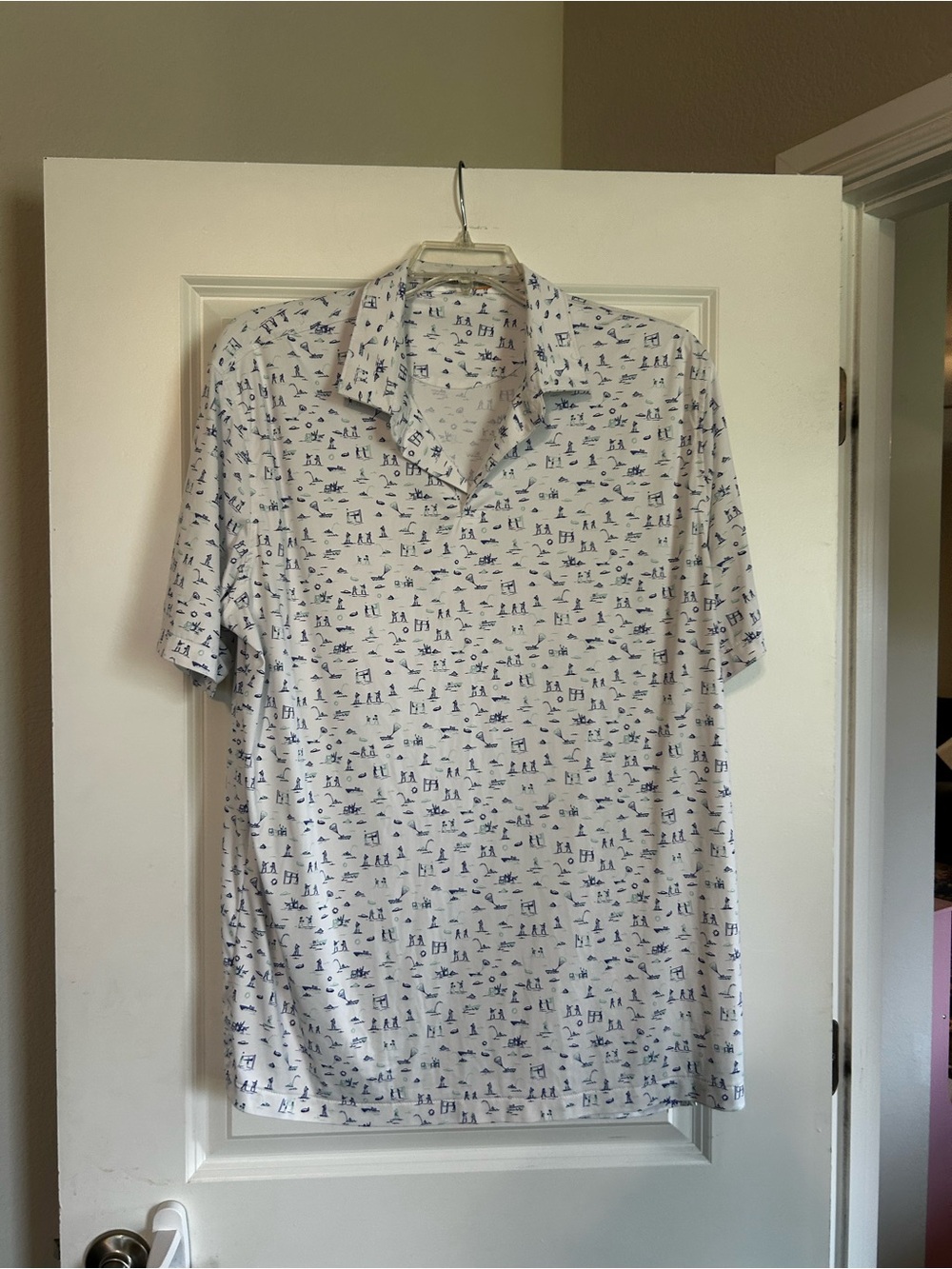Peter Millar White Polo with navy “water sports “ theme